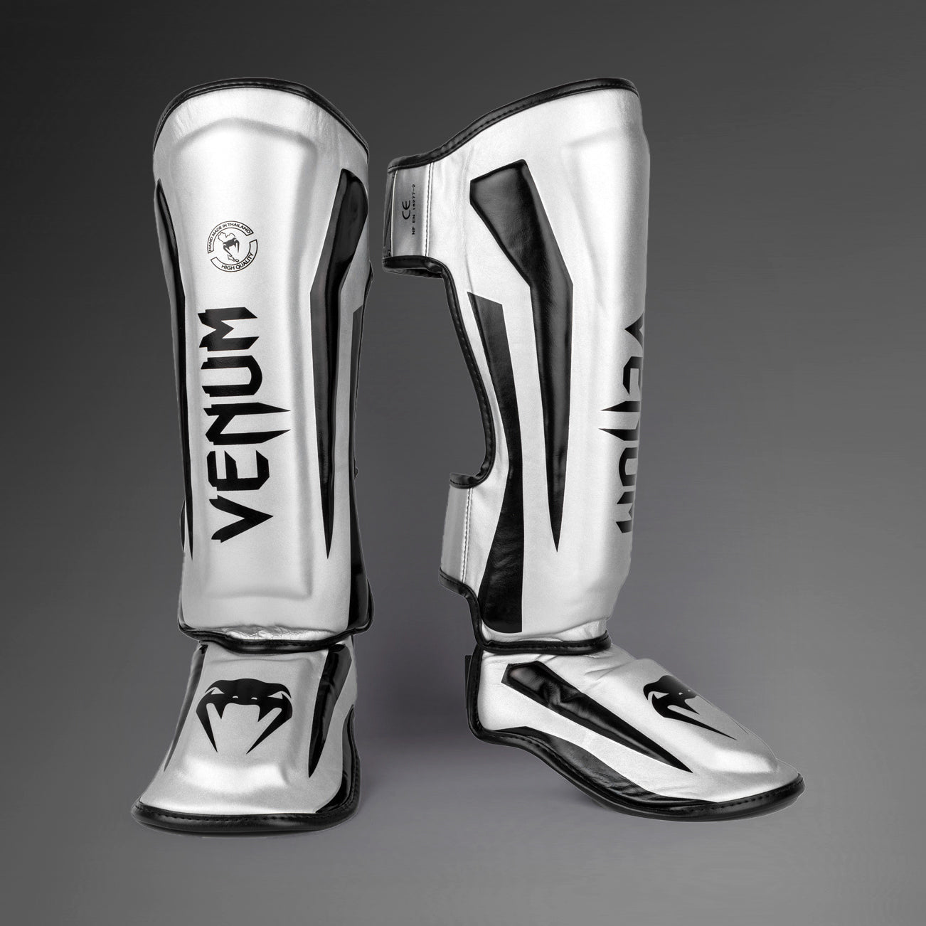 Venum Elite Espinilleras Standup - Plata/Negro