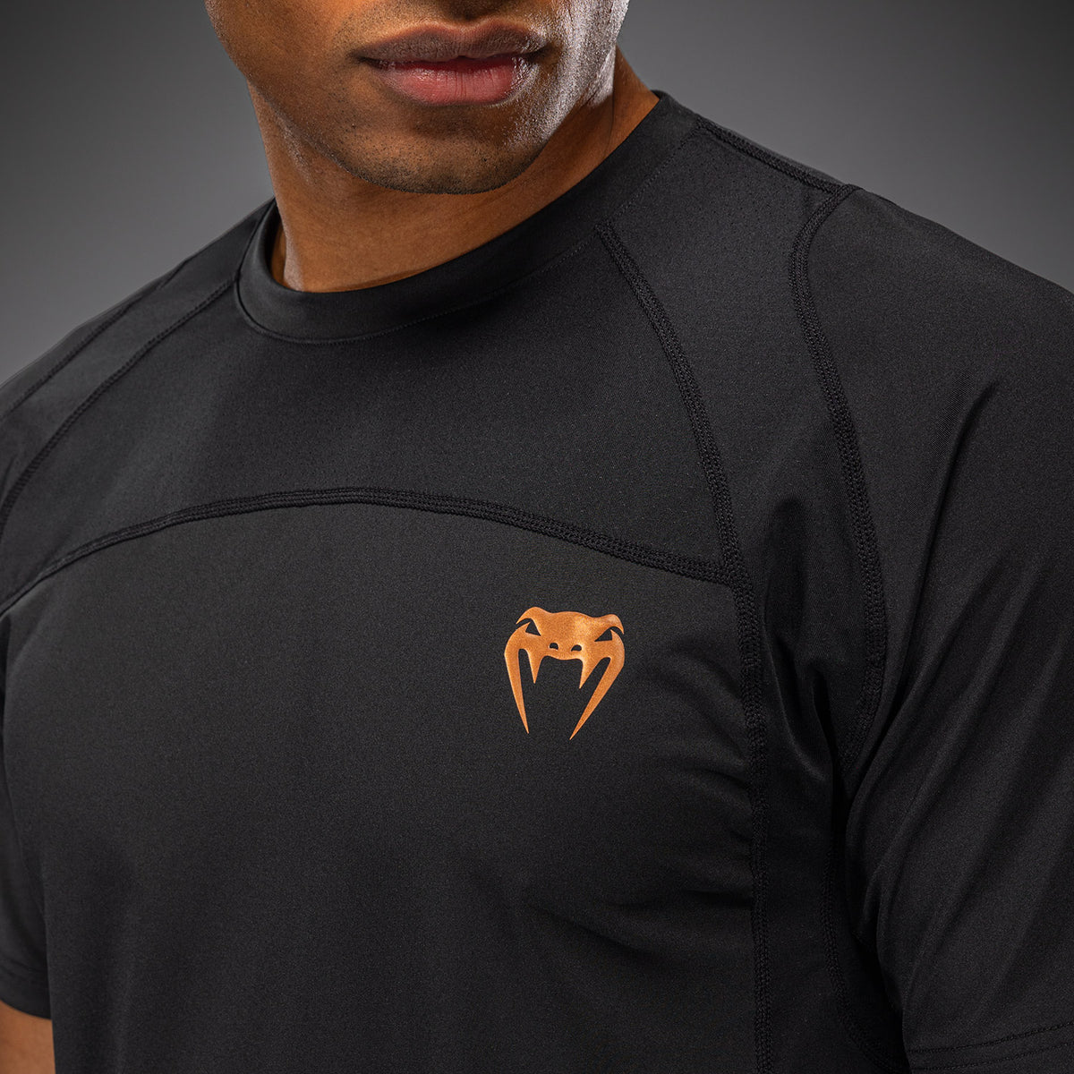 Venum G-Fit Revolution Camiseta Dry Tech - Negro/Cobre