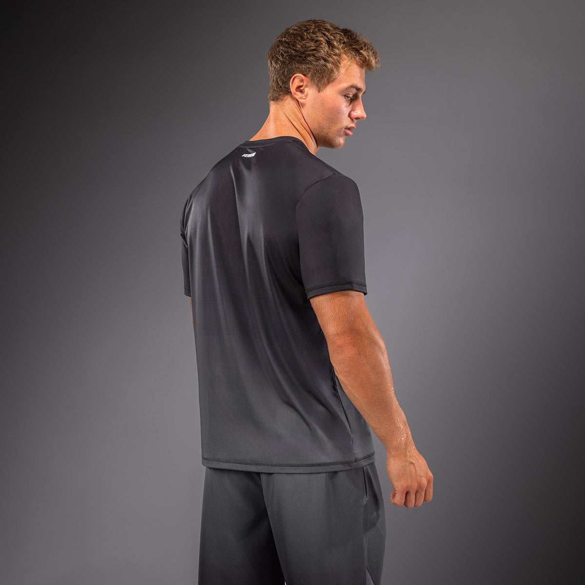 Venum Giant Shift Camiseta Dry Tech - Negro/Gris