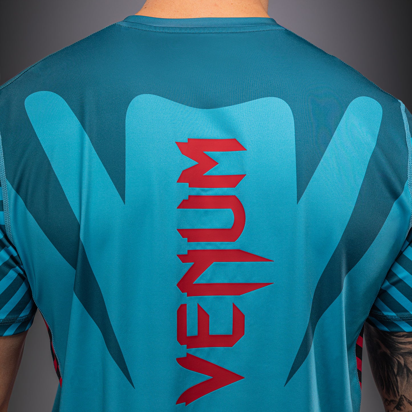 Venum Attack Camiseta Dry Tech – Turquesa/Rojo