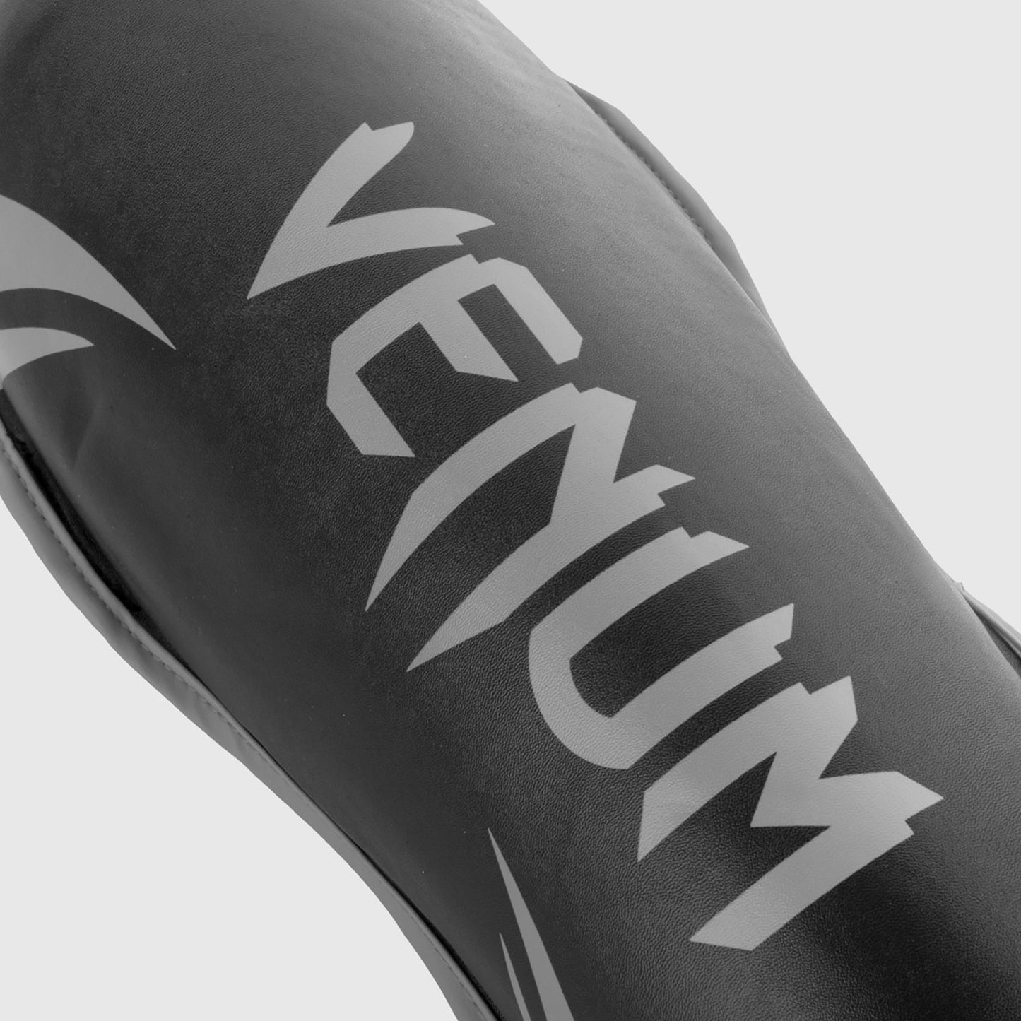 Venum Challenger Espinilleras – Negro/Gris