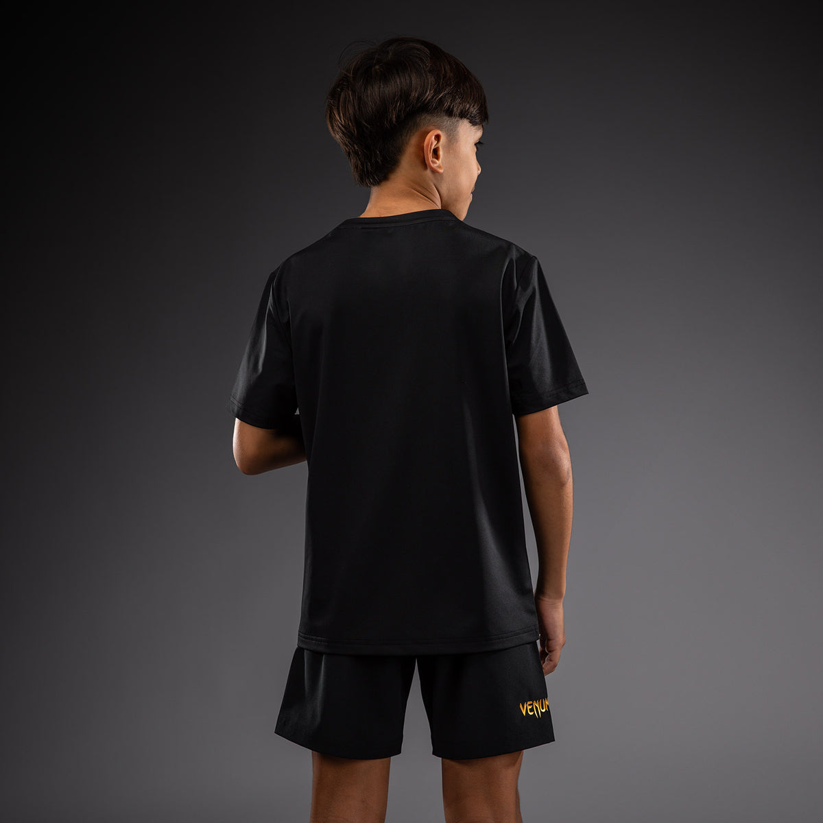 Venum Classic Camiseta Dry Tech para niños - Negro/Dorado