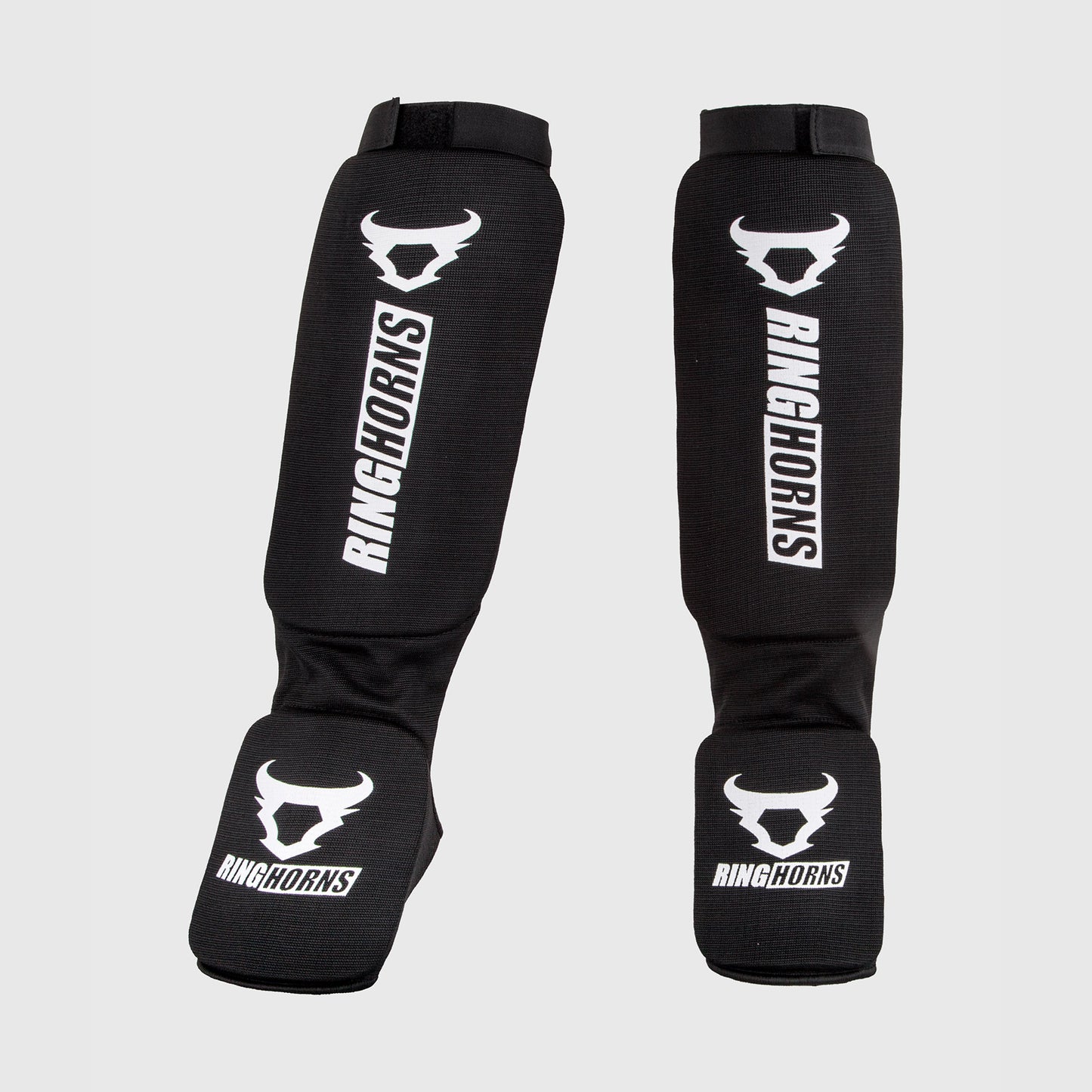Ringhorns Kontact Espinilleras – Negro