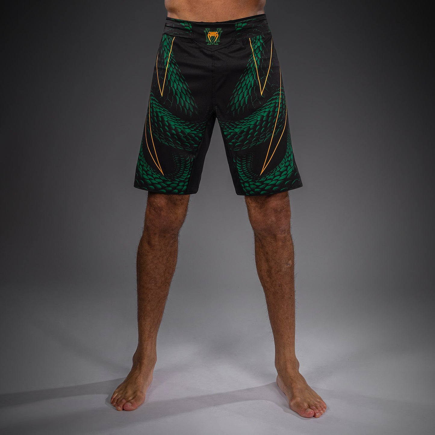 Venum Matupa Short de Combate - Negro/Verde/Oro