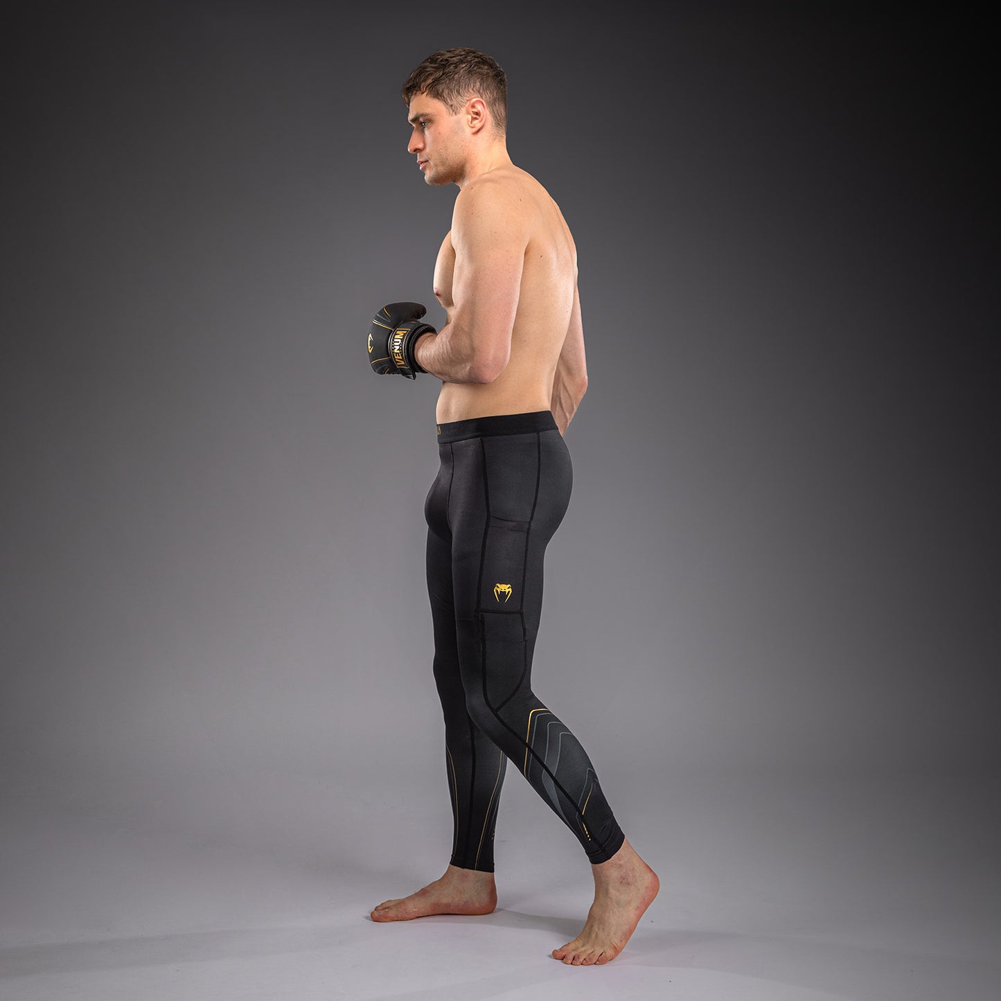 Venum Streamline Spats – Negro/Oro