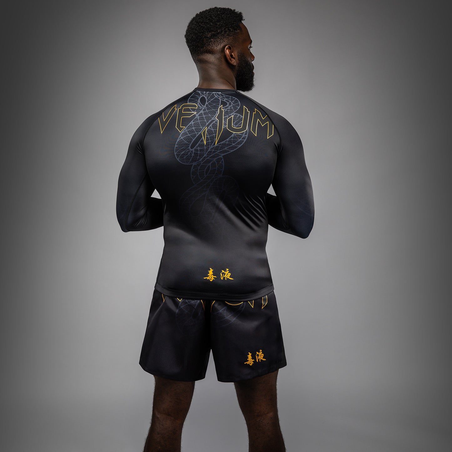 Venum Serpenti Rashguard Manga Larga – Negro/Plata/Dorado