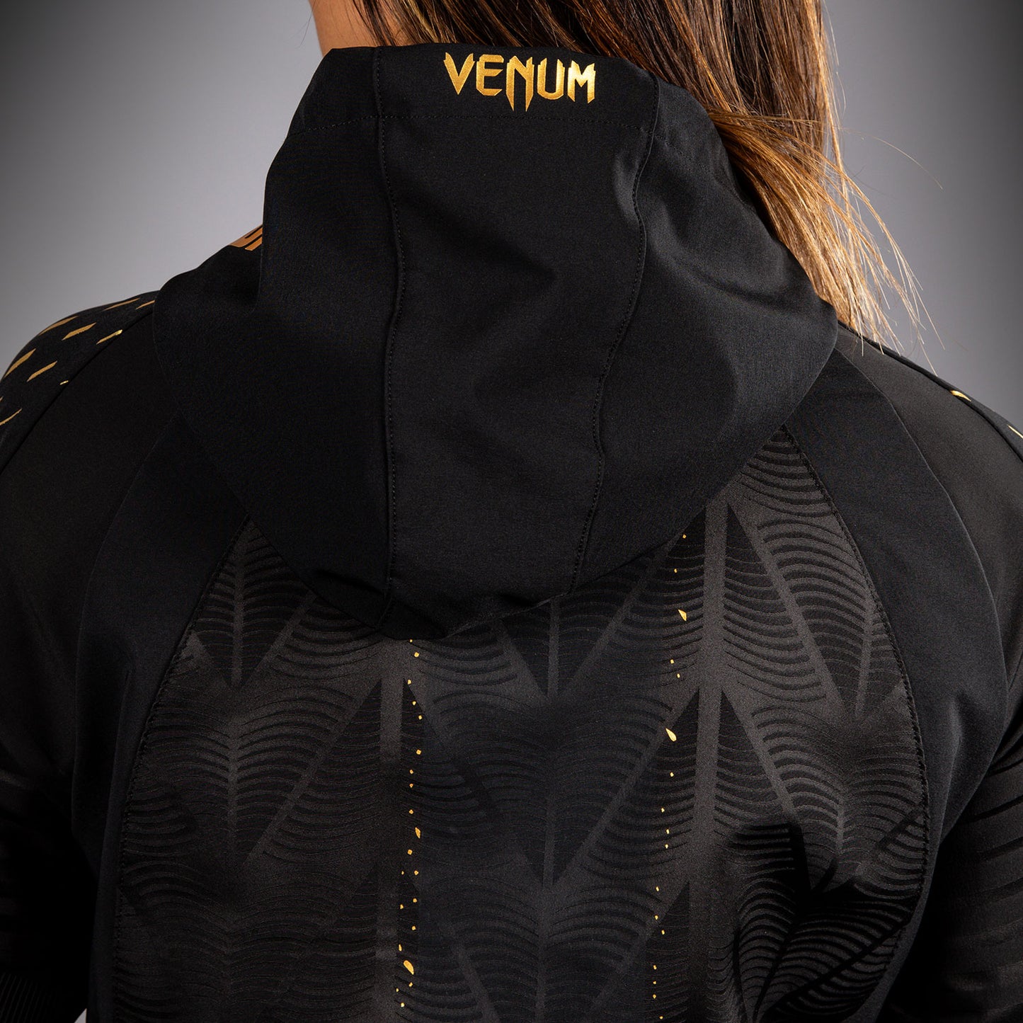 UFC Zenith by Venum Authentic Fight Night Sudadera de walkout Mujer - Champion