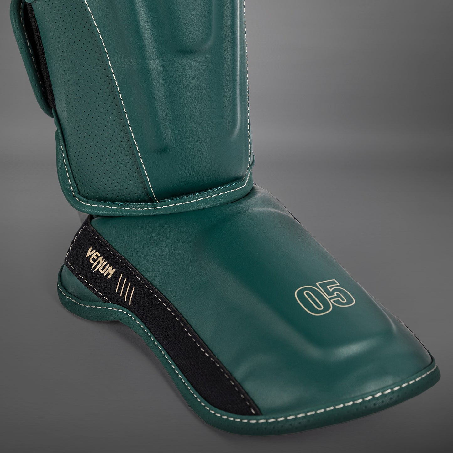 Venum Impact Evo Espinilleras - Verde Esmeralda