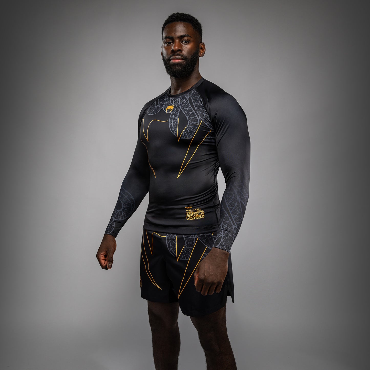 Venum Serpenti Rashguard Manga Larga – Negro/Plata/Dorado