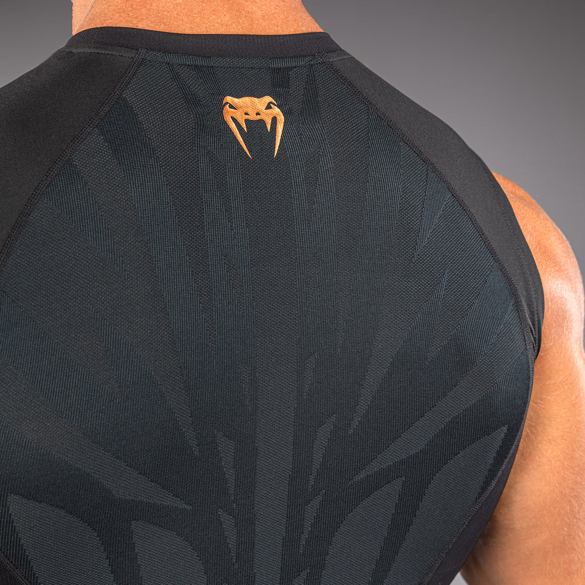 Venum G-Fit Revolution Rashguard sin mangas - Negro/Cobre