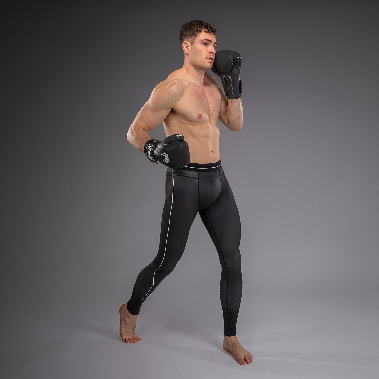Venum Stealth Spats – Negro/Blanco