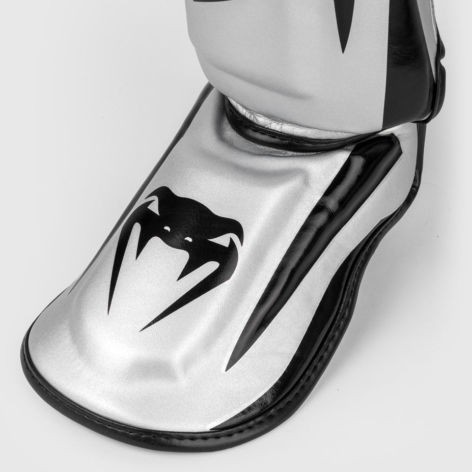 Venum Elite Espinilleras Standup - Plata/Negro