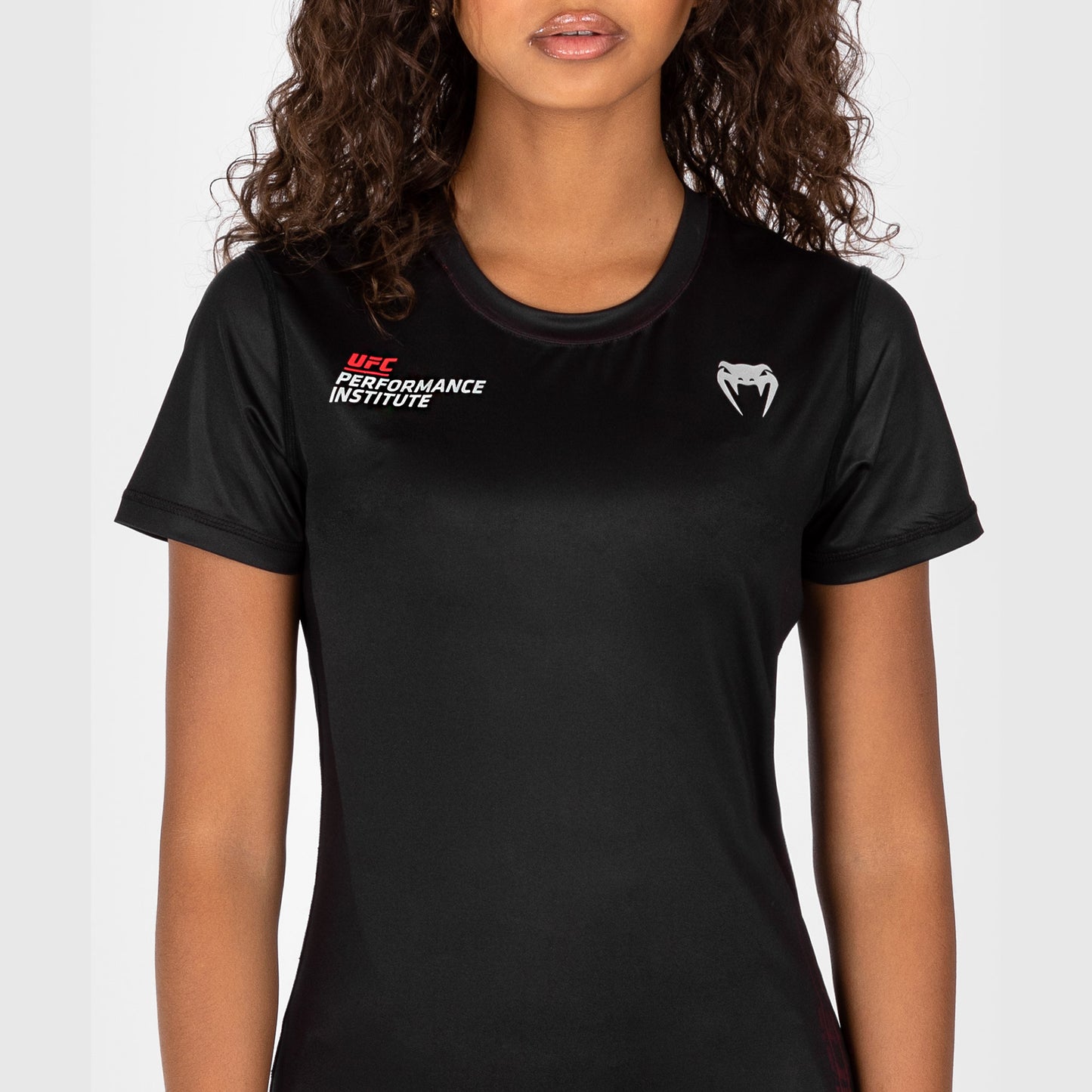 UFC Venum Performance Institute 2.0 Camiseta Dry-Tech para Mujer - Negra/Roja