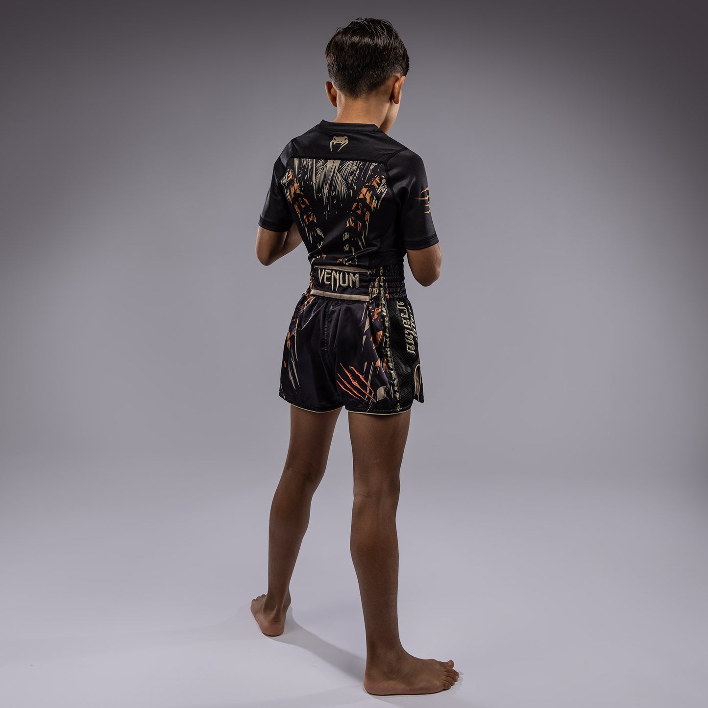 Venum Tiger Pantalones Cortos de Muay Thai para Niños - Negro/Naranja Neón