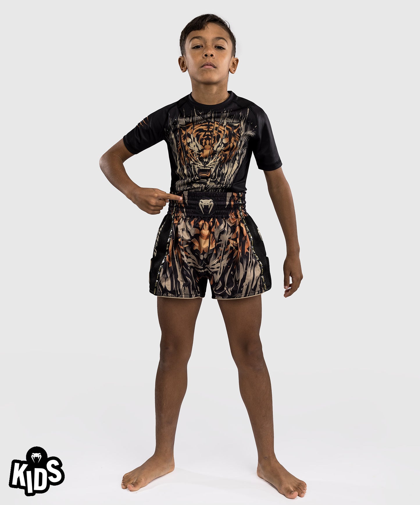 Venum Tiger Pantalones Cortos de Muay Thai para Niños - Negro/Naranja Neón