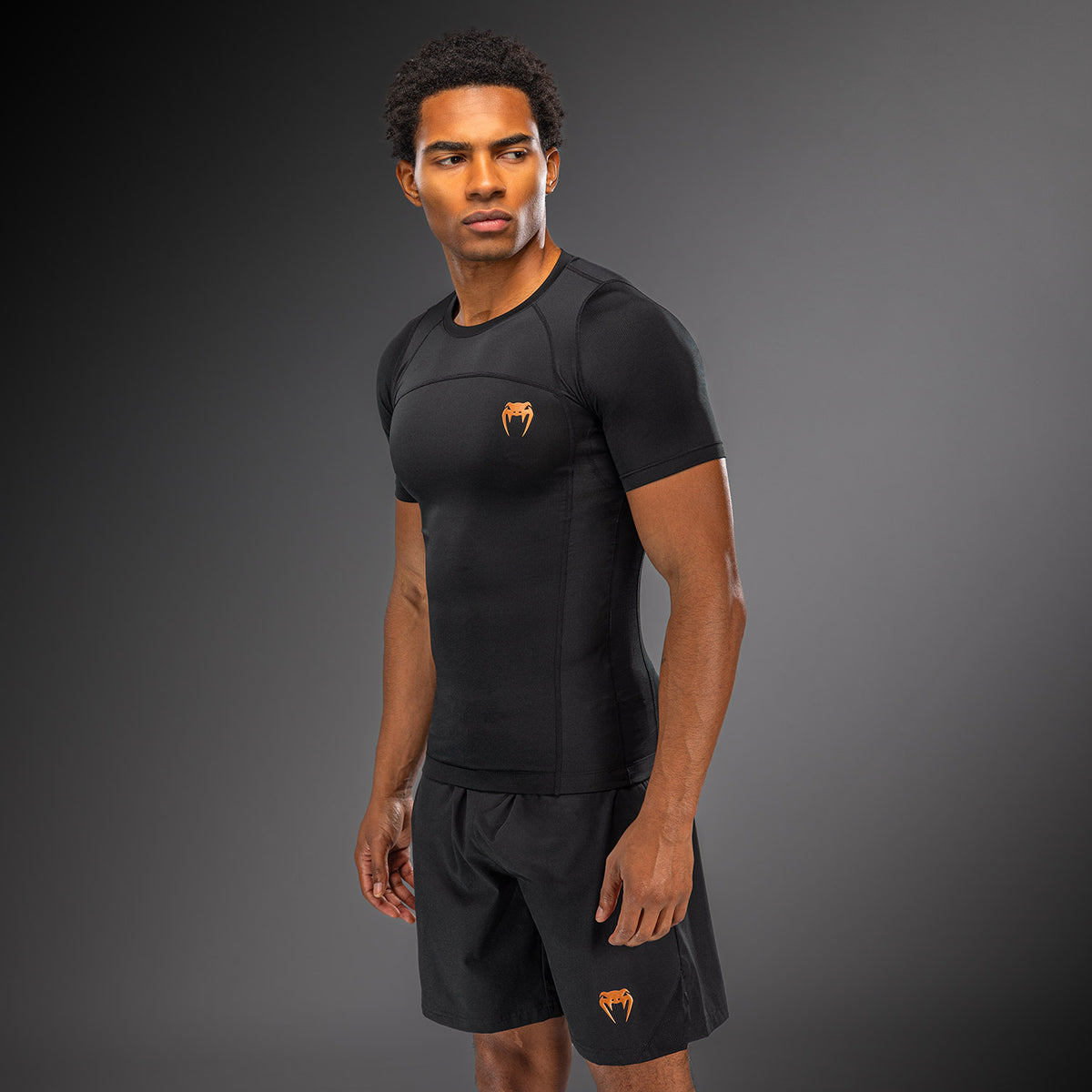 Venum G-Fit Revolution Rashguard de manga corta - Negro/Cobre