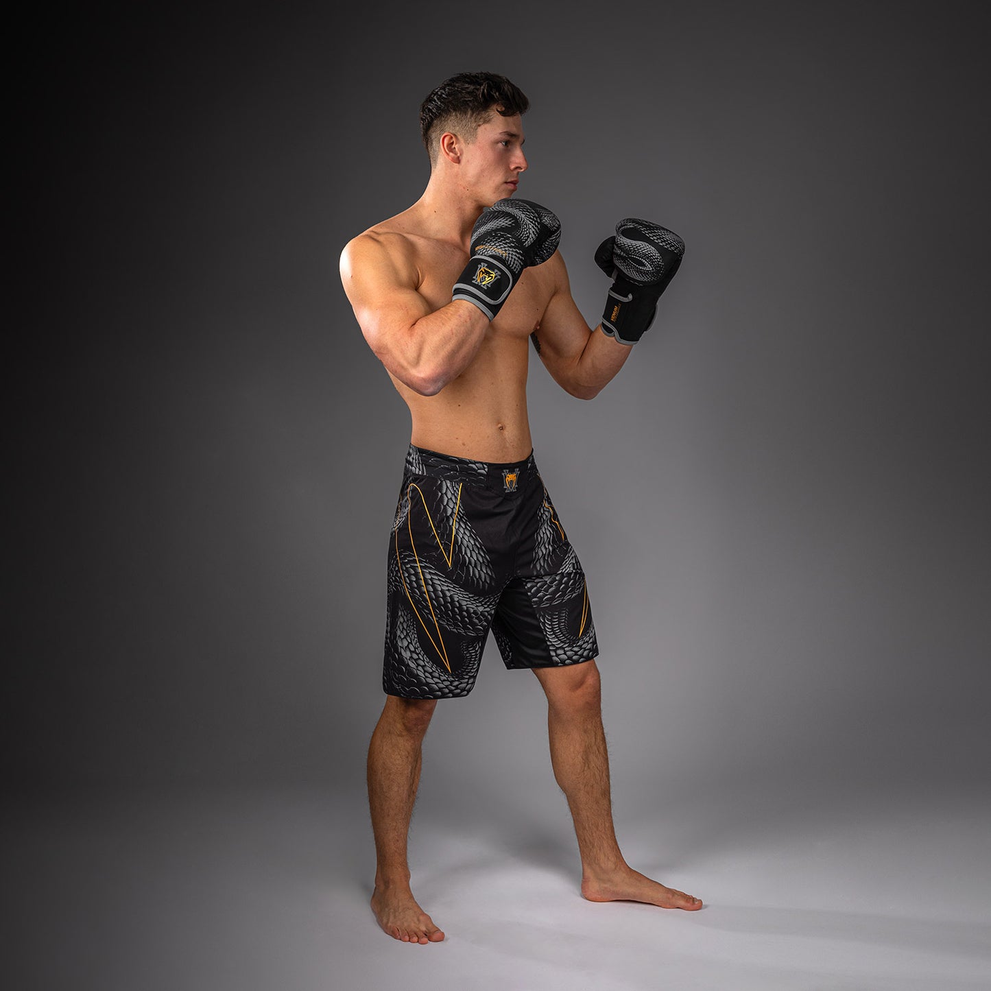 Venum Matupa Short de Combate - Negro/Gris/Oro