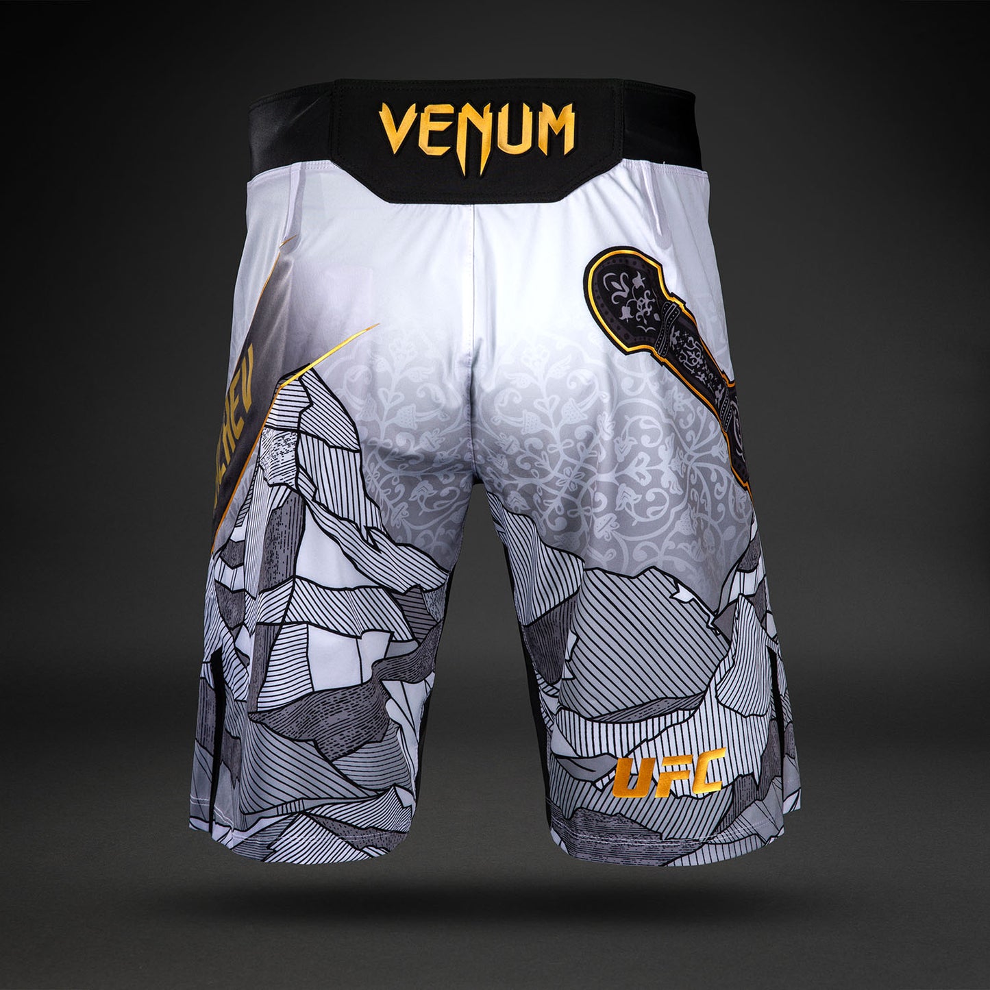 UFC Unrivaled by Venum Islam Makhachev Pantalones de Lucha para Hombres - Blanco/Negro