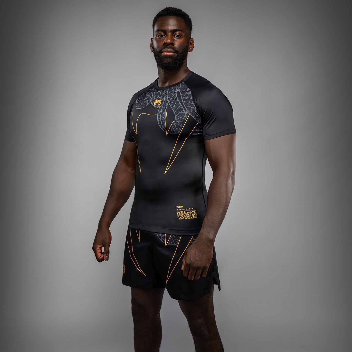 Venum Serpenti Rashguard de Manga Corta – Negro/Plata/Dorado
