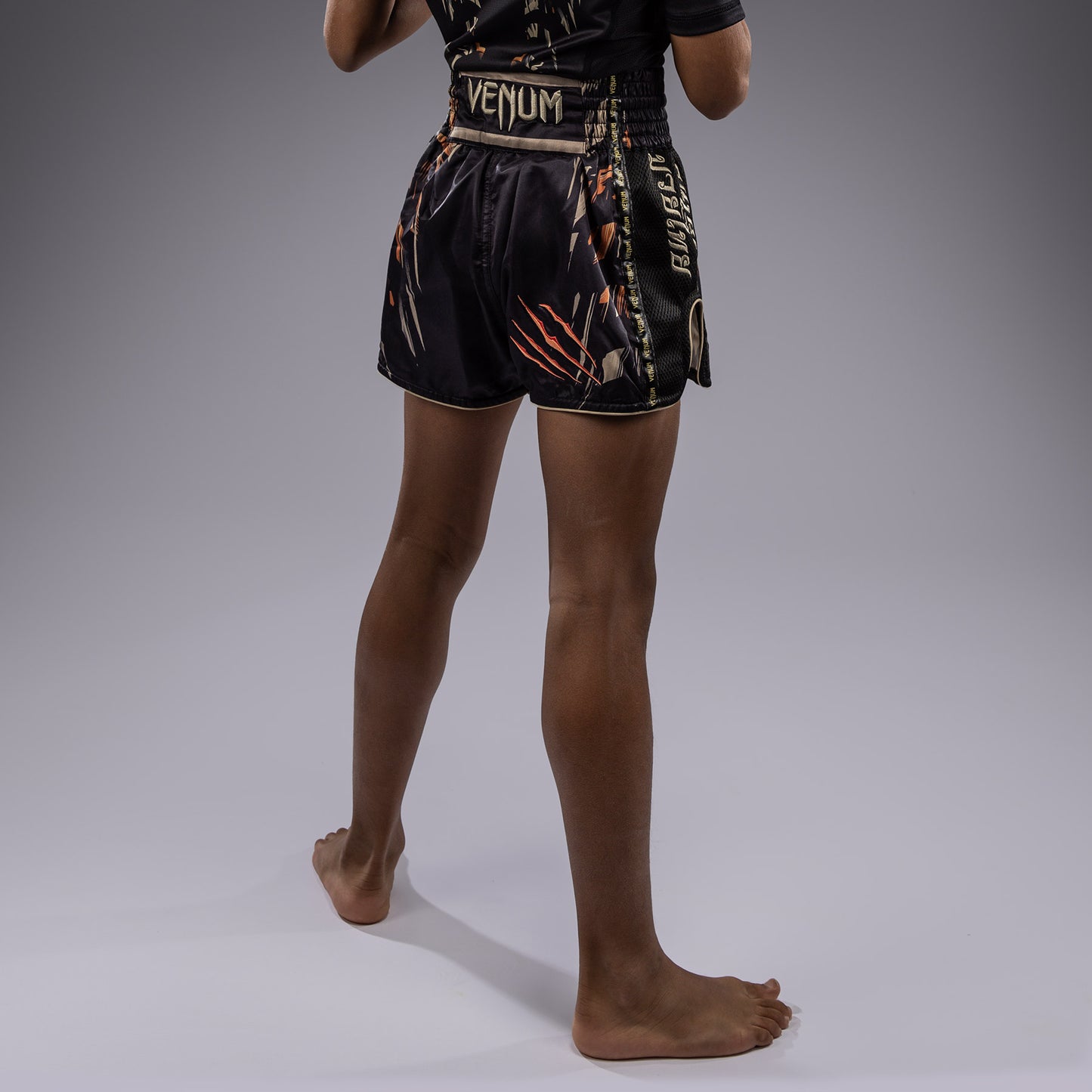 Venum Tiger Pantalones Cortos de Muay Thai para Niños - Negro/Naranja Neón