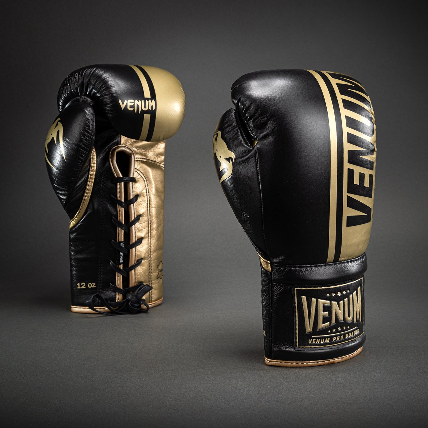 Guantes de boxeo profesionales Venum Shield con cordones - Negro/Dorado