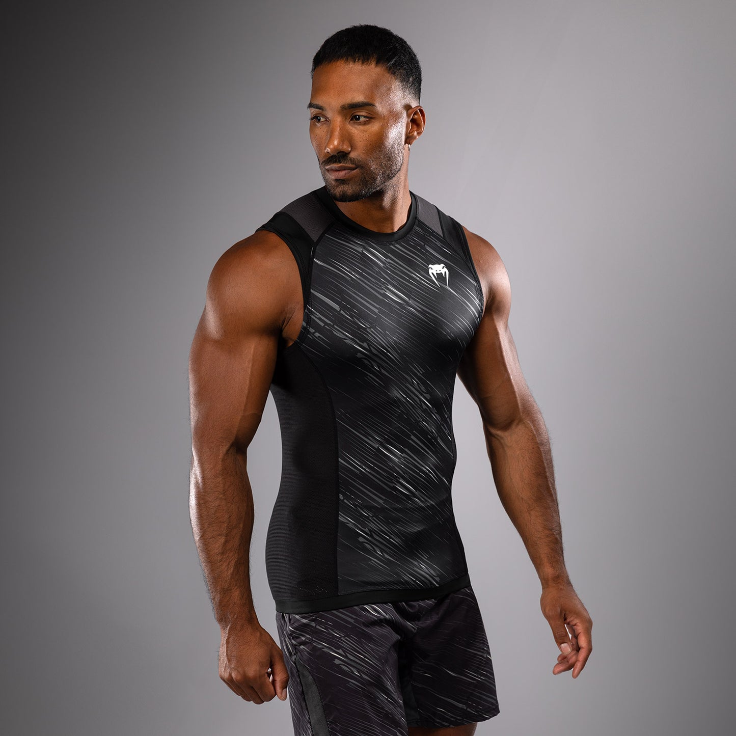 Venum Rapid Rashguard sin Manga - Negro/Gris Tormenta