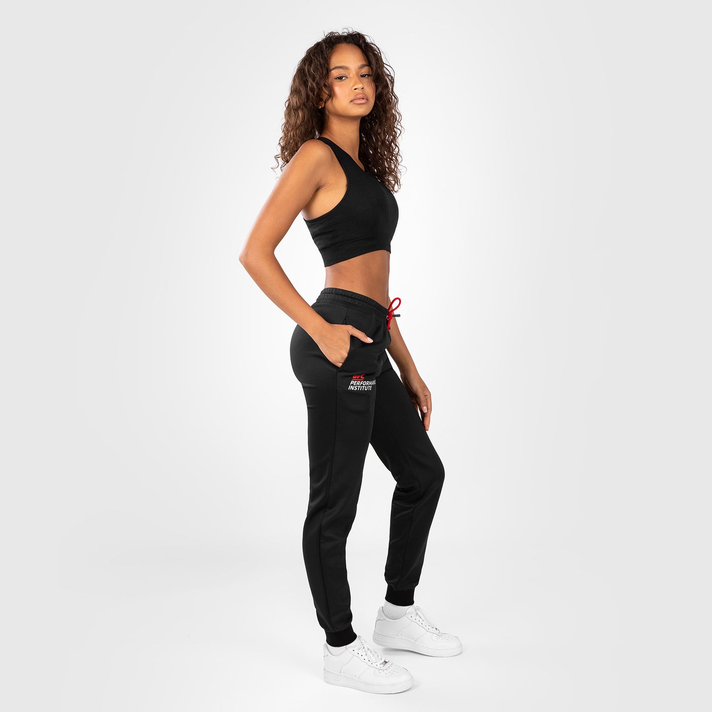 UFC Venum Performance Institute 2.0 Pantalón de Chándal para Mujer - Negro/Rojo