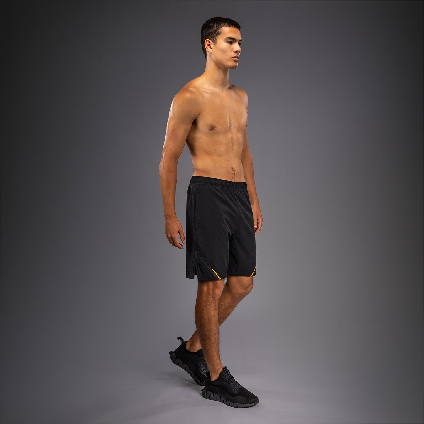 Venum G-Core Pantalón Corto de Entrenamiento - Negro/Oro