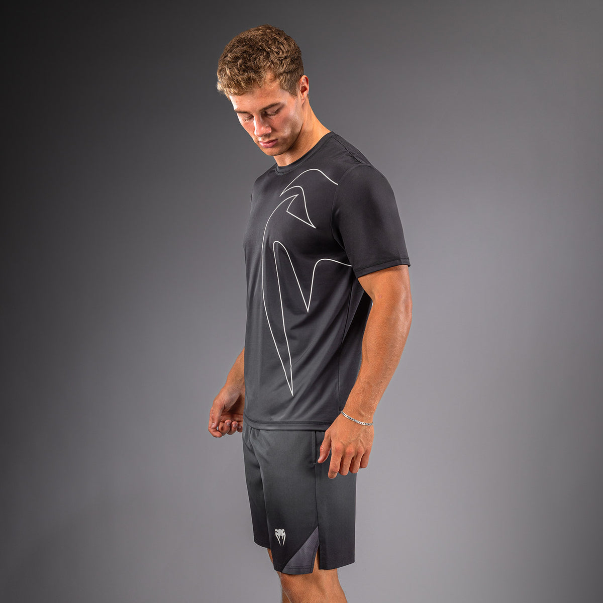 Venum Giant Shift Camiseta Dry Tech - Negro/Gris