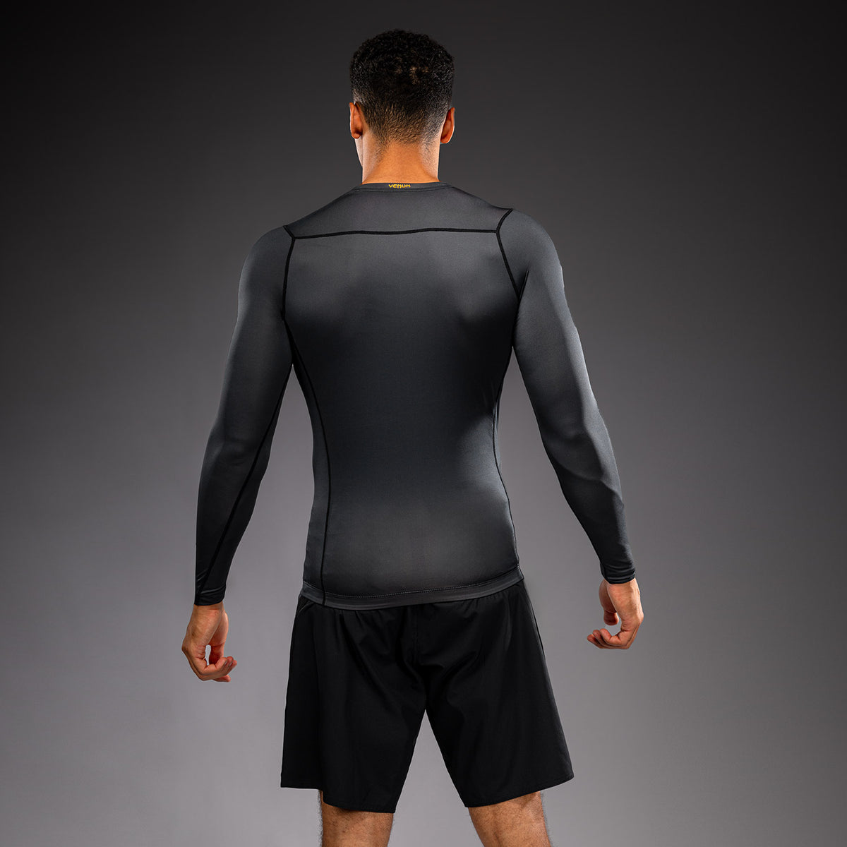 Venum Attack Rashguard de manga larga - Negro/Dorado