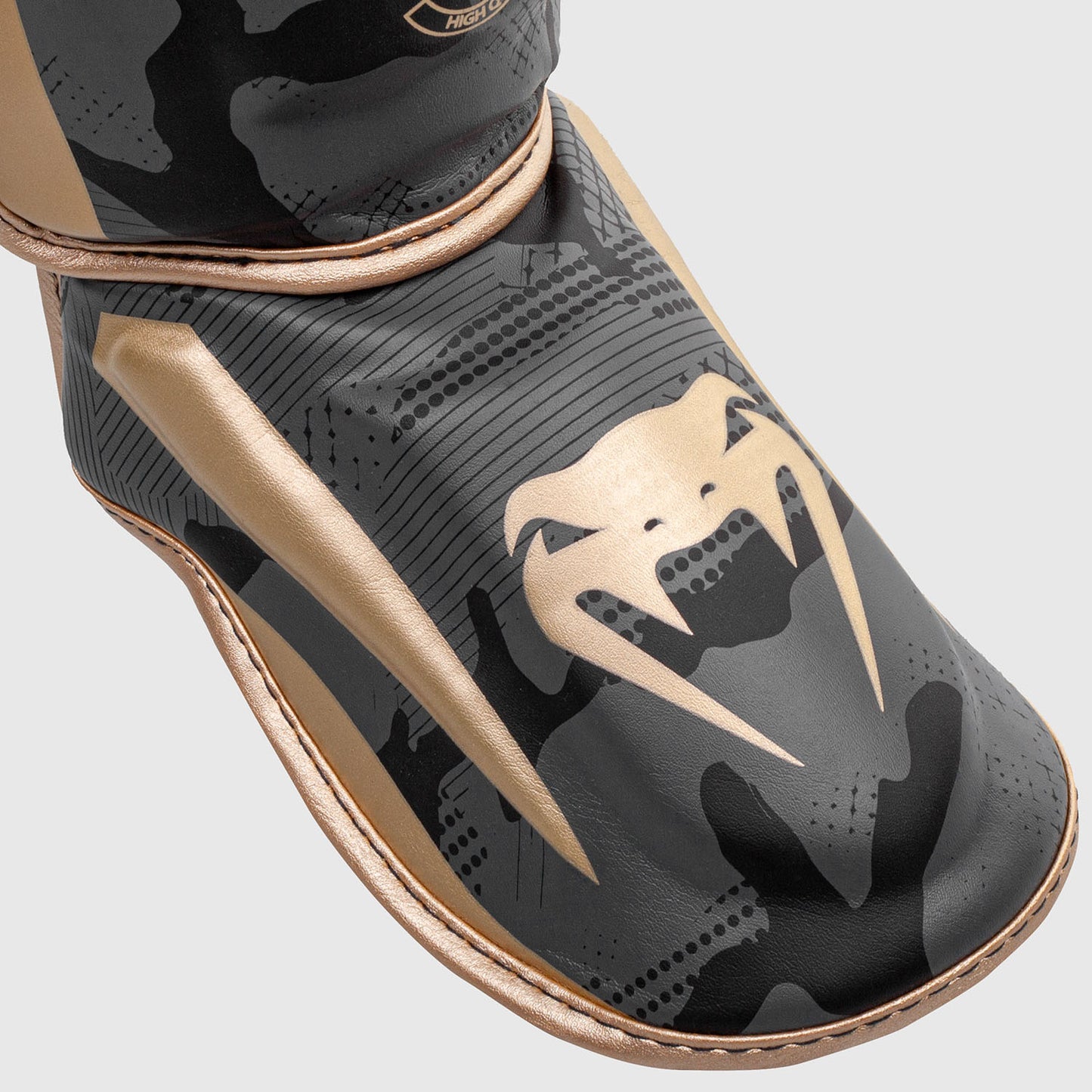 Espinillera Venum Elite - Camuflaje dorado