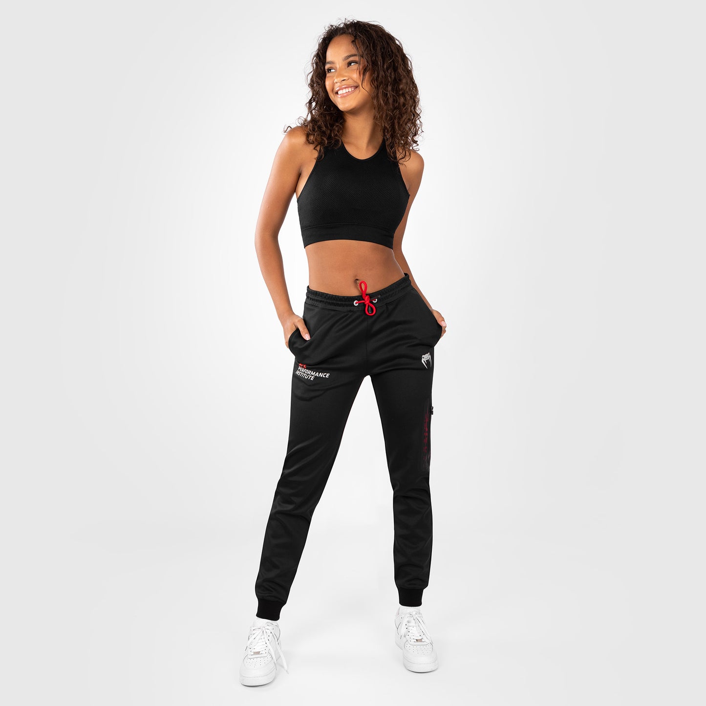 UFC Venum Performance Institute 2.0 Pantalón de Chándal para Mujer - Negro/Rojo