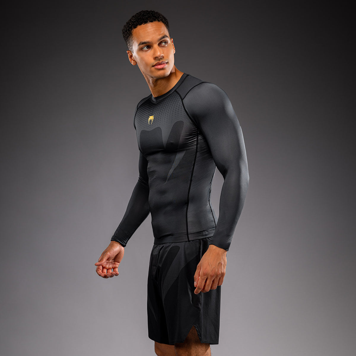 Venum Attack Rashguard de manga larga - Negro/Dorado