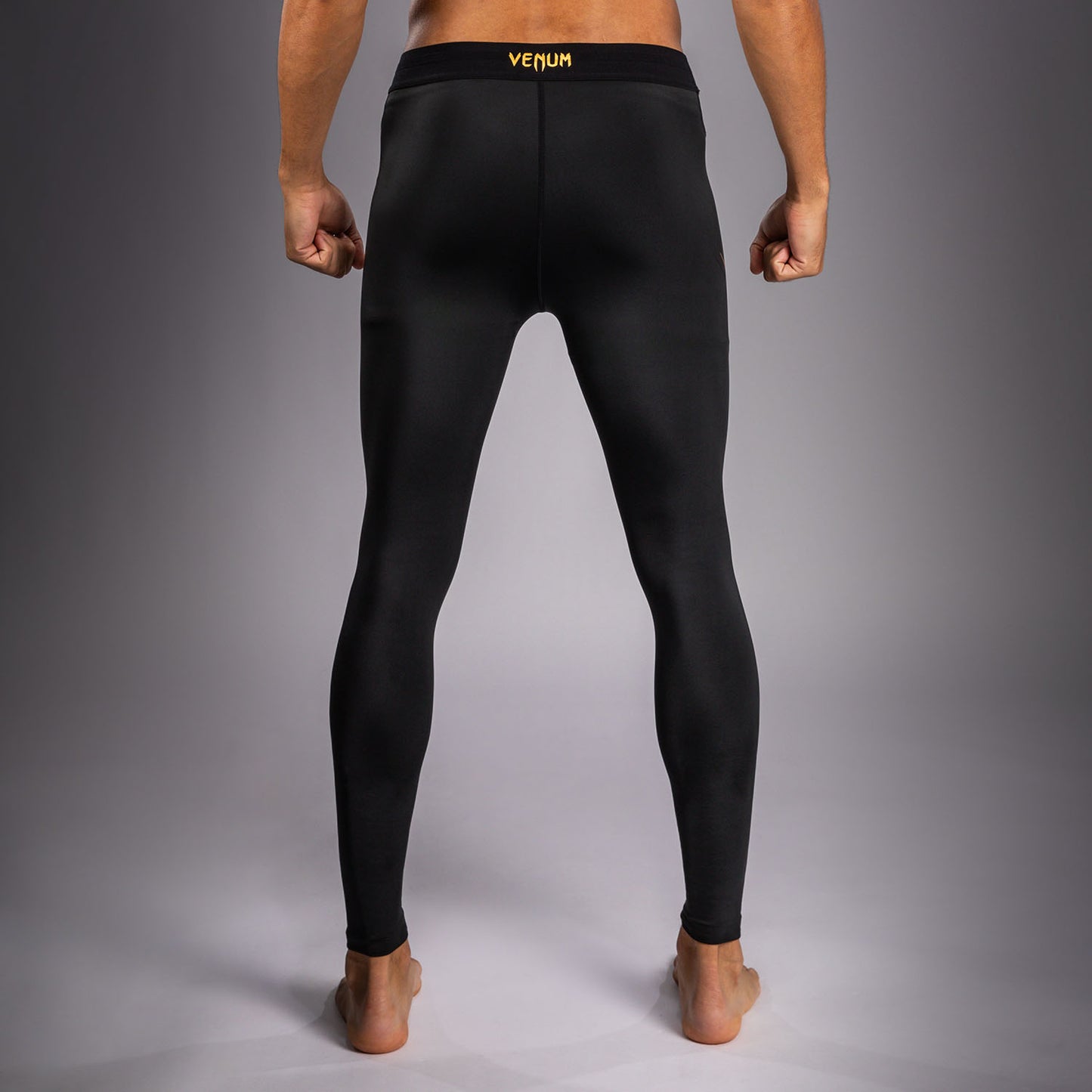 Venum G-Core Spats - Negro/Oro