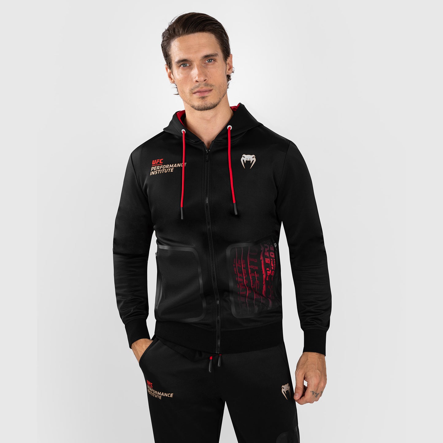 UFC Venum Performance Institute 2.0 Sudadera con cremallera para hombre - Negra/Roja