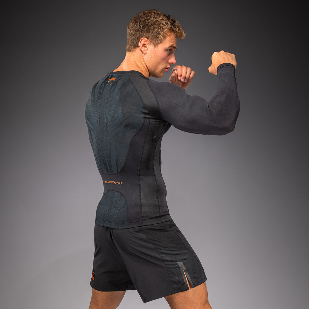 Venum G-Fit Revolution Rashguard de manga larga - Negro/Cobre