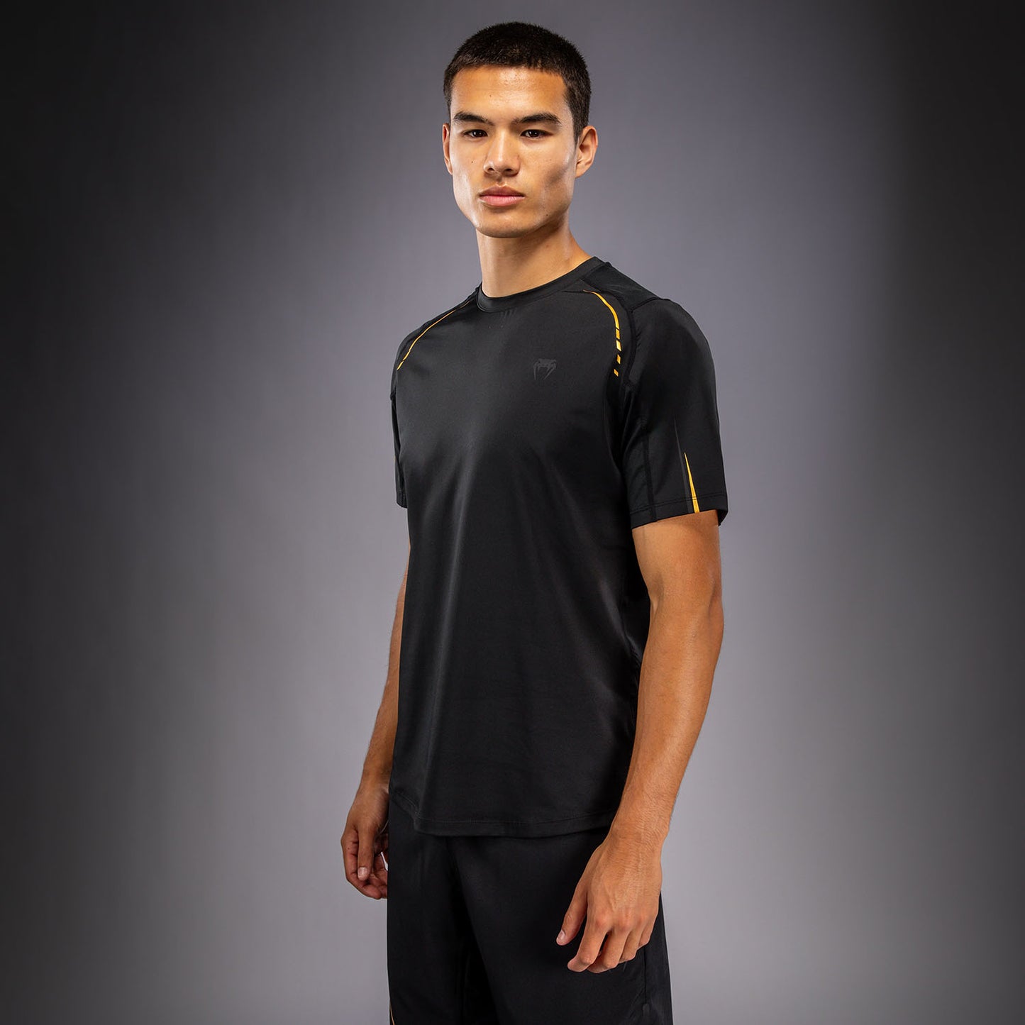 Venum G-Core Camiseta Dry Tech - Negro/Oro