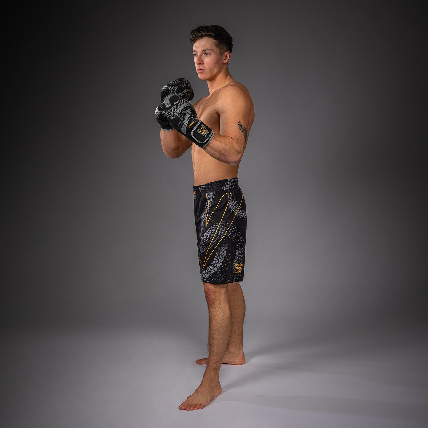 Venum Matupa Short de Combate - Negro/Gris/Oro