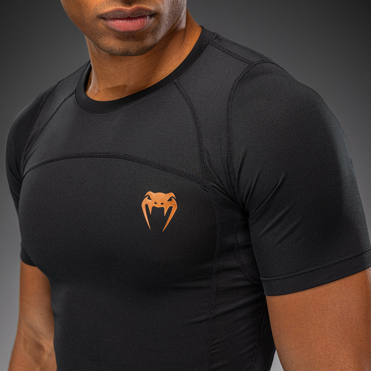 Venum G-Fit Revolution Rashguard de manga corta - Negro/Cobre