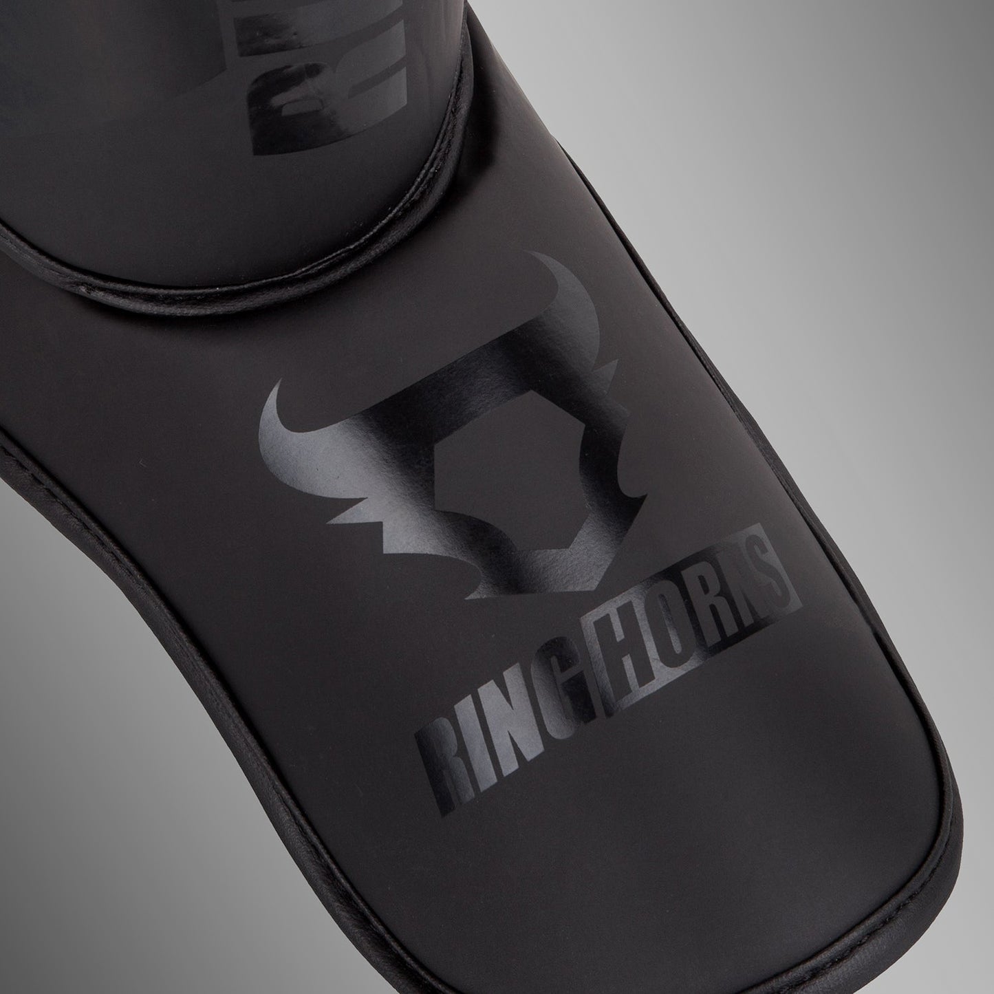 Espinilleras Ringhorns Charger - Negro/Negro