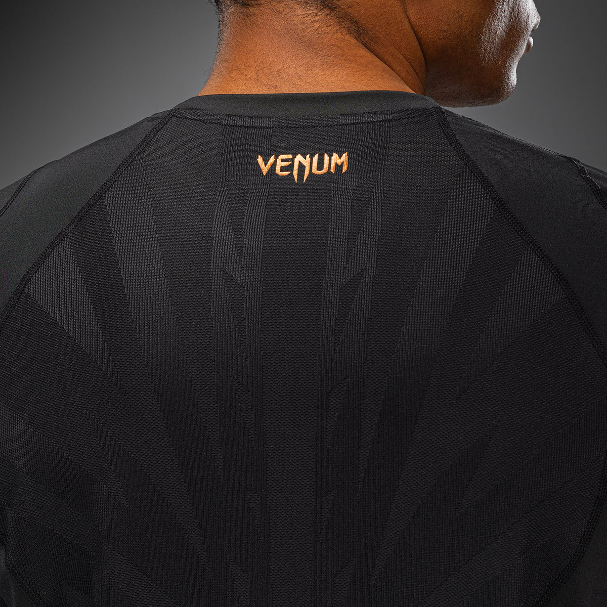 Venum G-Fit Revolution Camiseta Dry Tech - Negro/Cobre