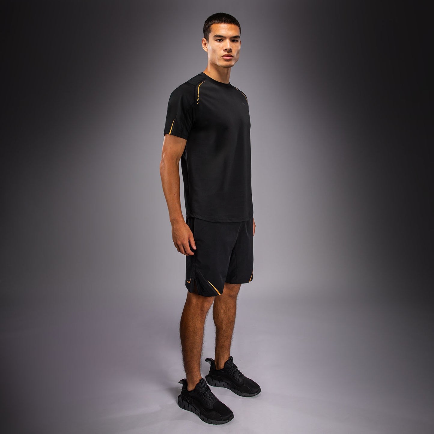 Venum G-Core Camiseta Dry Tech - Negro/Oro