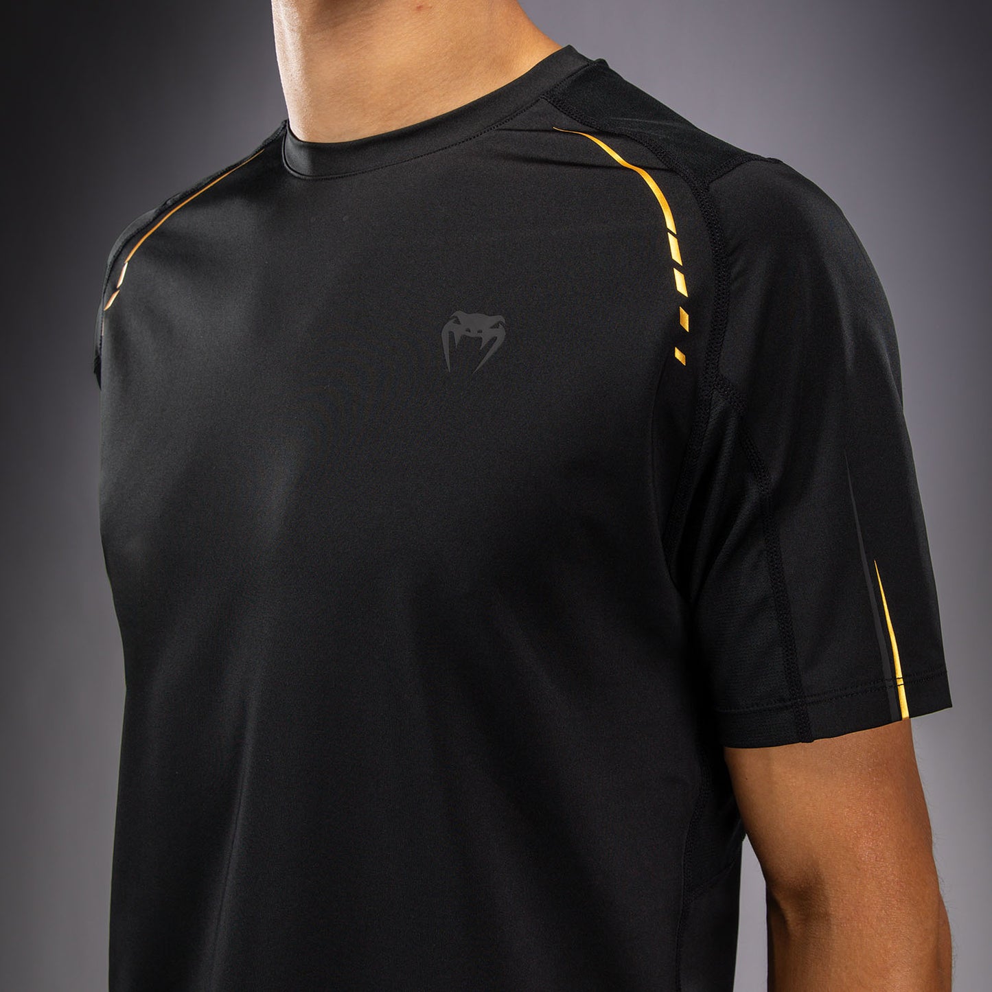 Venum G-Core Camiseta Dry Tech - Negro/Oro