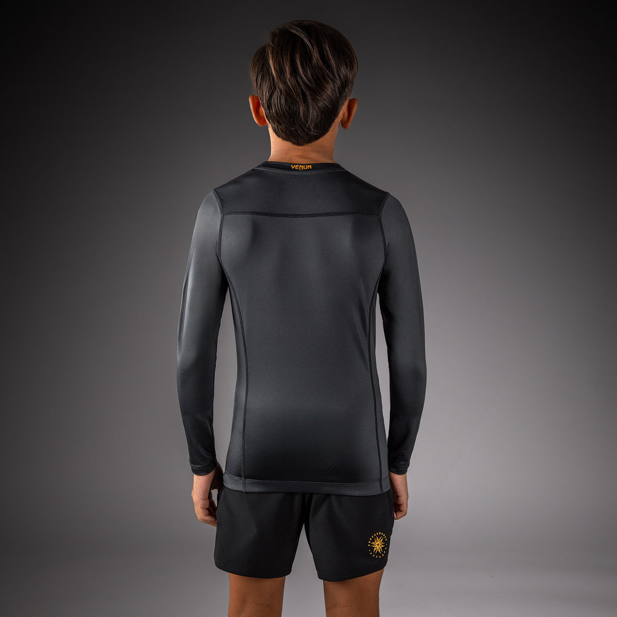 Venum Attack Rashguard de manga larga para niños - Negro/Dorado