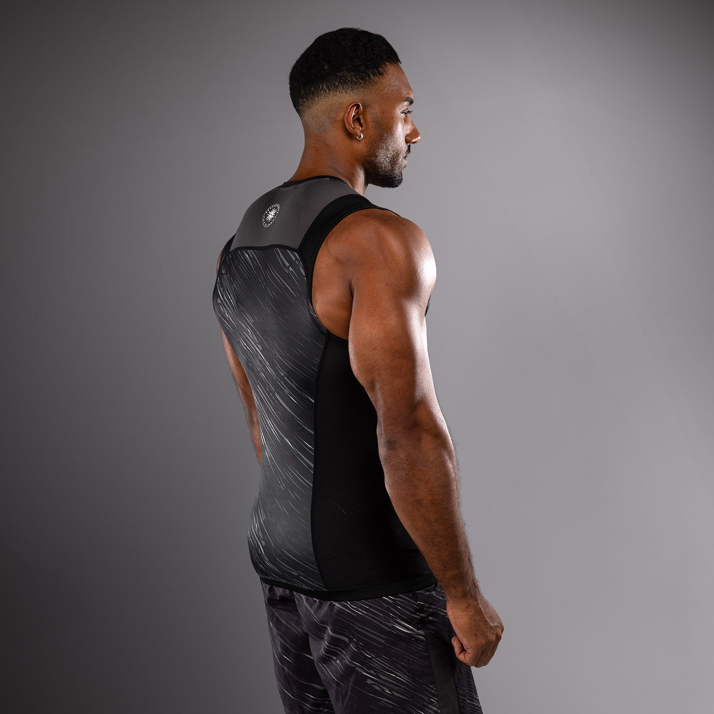 Venum Rapid Rashguard sin Manga - Negro/Gris Tormenta