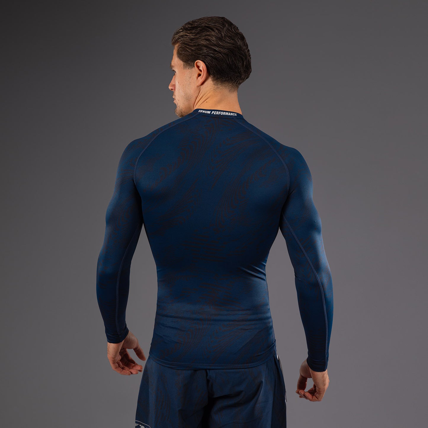 UFC Fusion by Venum Fight Week Rashguard de Manga Larga de Rendimiento para Hombre - Azul oceánico