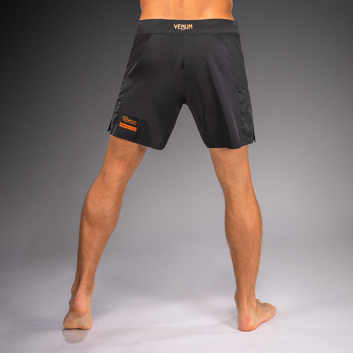 Venum G-Fit Revolution Fightshorts - Negro/Cobre