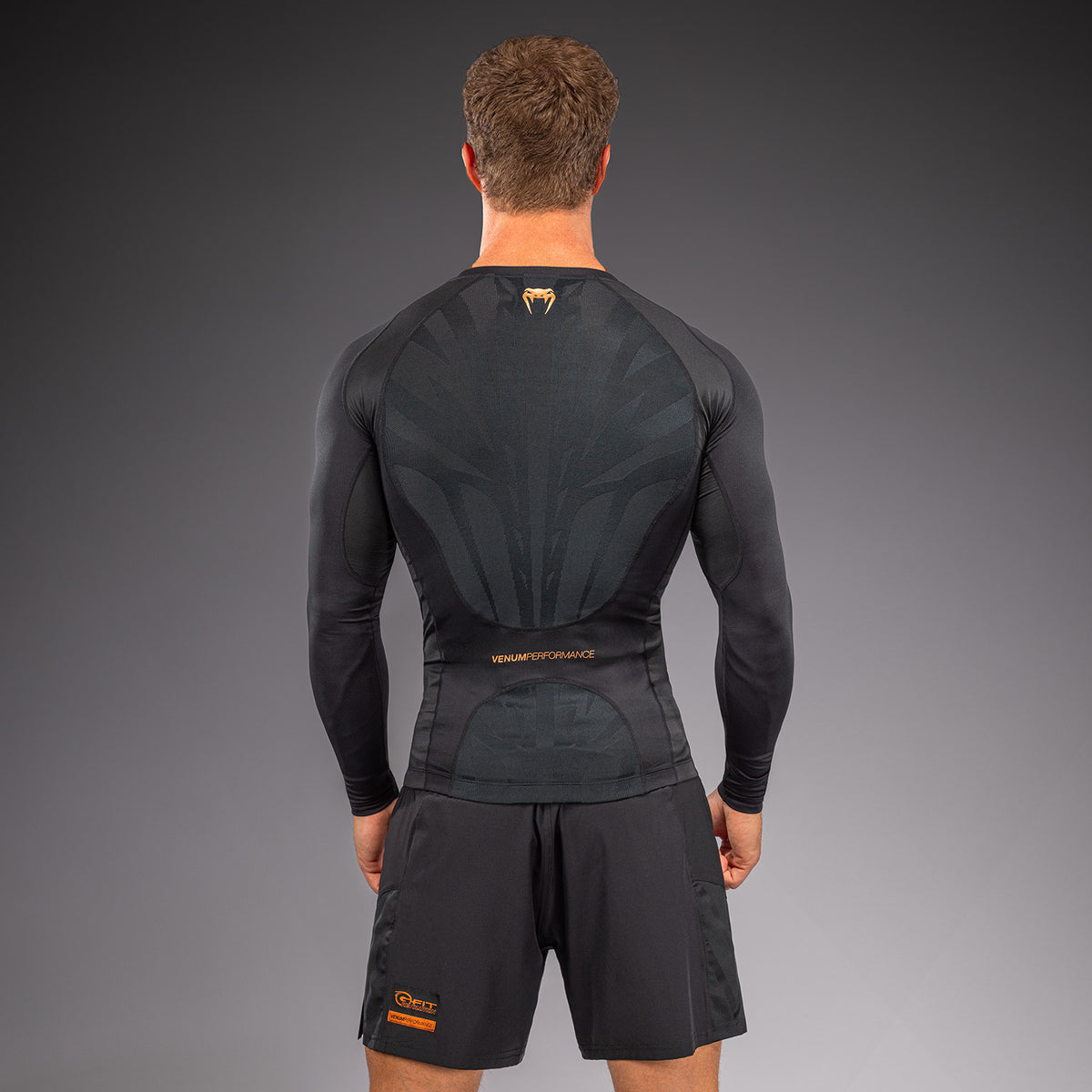 Venum G-Fit Revolution Rashguard de manga larga - Negro/Cobre