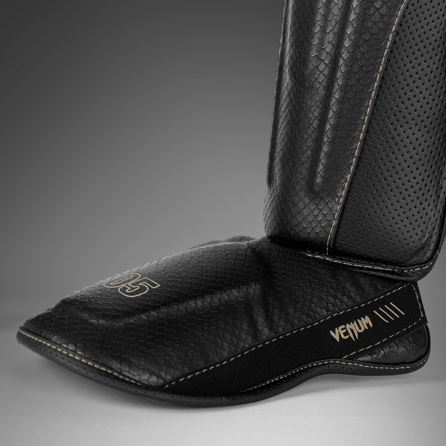 Venum Impact Evo Scales Espinilleras – Negro