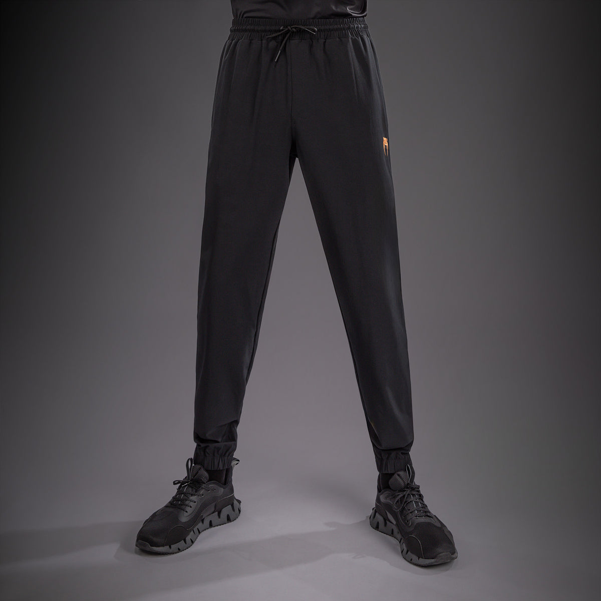 Venum G-Fit Revolution Pantalón de chándal - Negro/Cobre